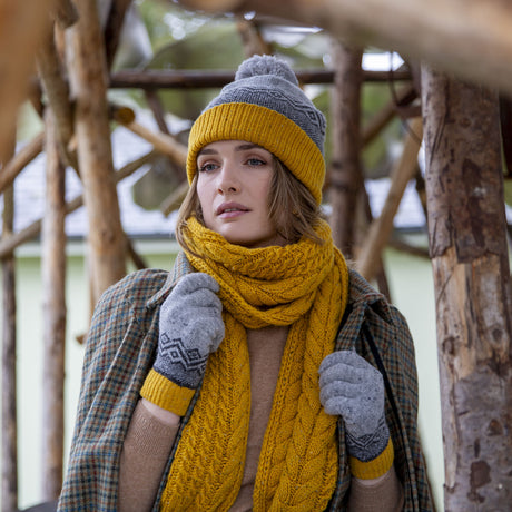 Dents Women’s Jacquard Knitted Bobble Hat with Geometric Pattern - Yellow/Grey