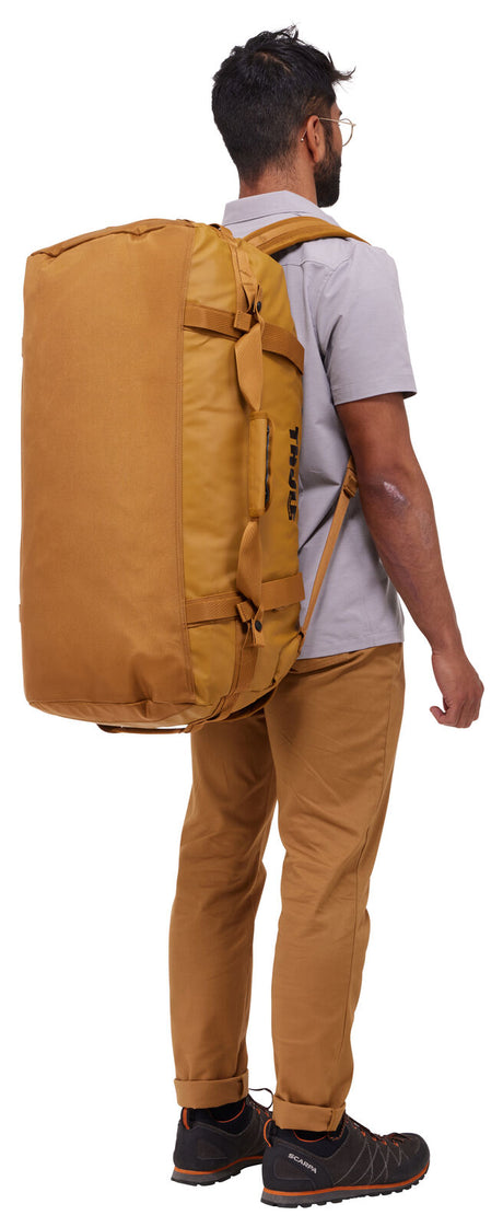Thule Chasm 70L Duffel Overnight Bag Convertible Backpack Duffle in Golden